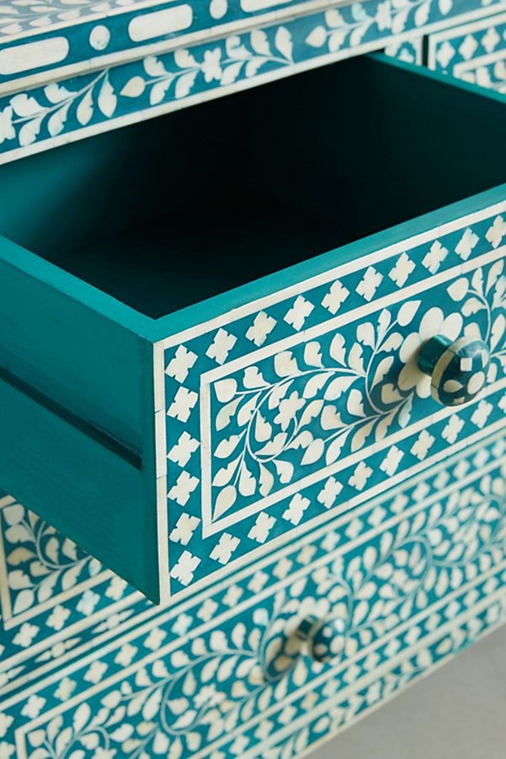 Closeup of teal green open Drawer