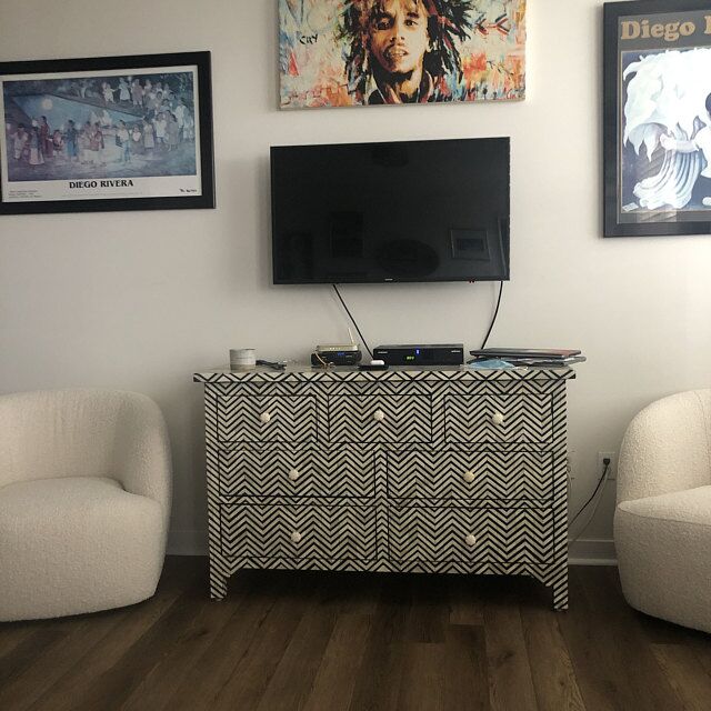 Bone Inaly Chest with 7 drwers in a room